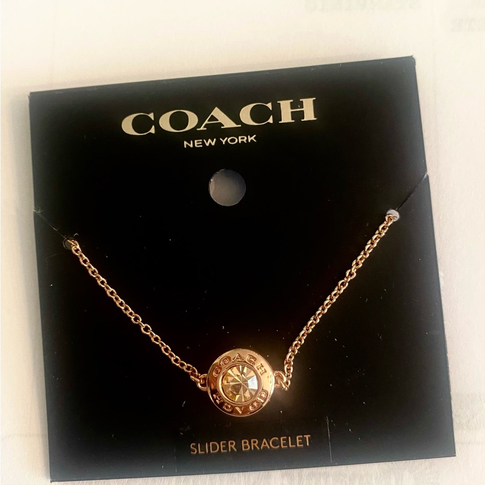 Coach rose gold slider bracelet. Never worn.